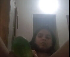 73cszycyt36m Horny young girl taking huge cucumber inside