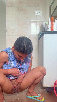 Resmi Nair Taking a Piss ~ App Content